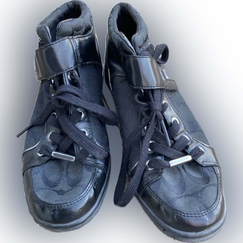 Coach black-on-black logo, genuine leather, “mid-top” sneaker. Women’s 8.5M.